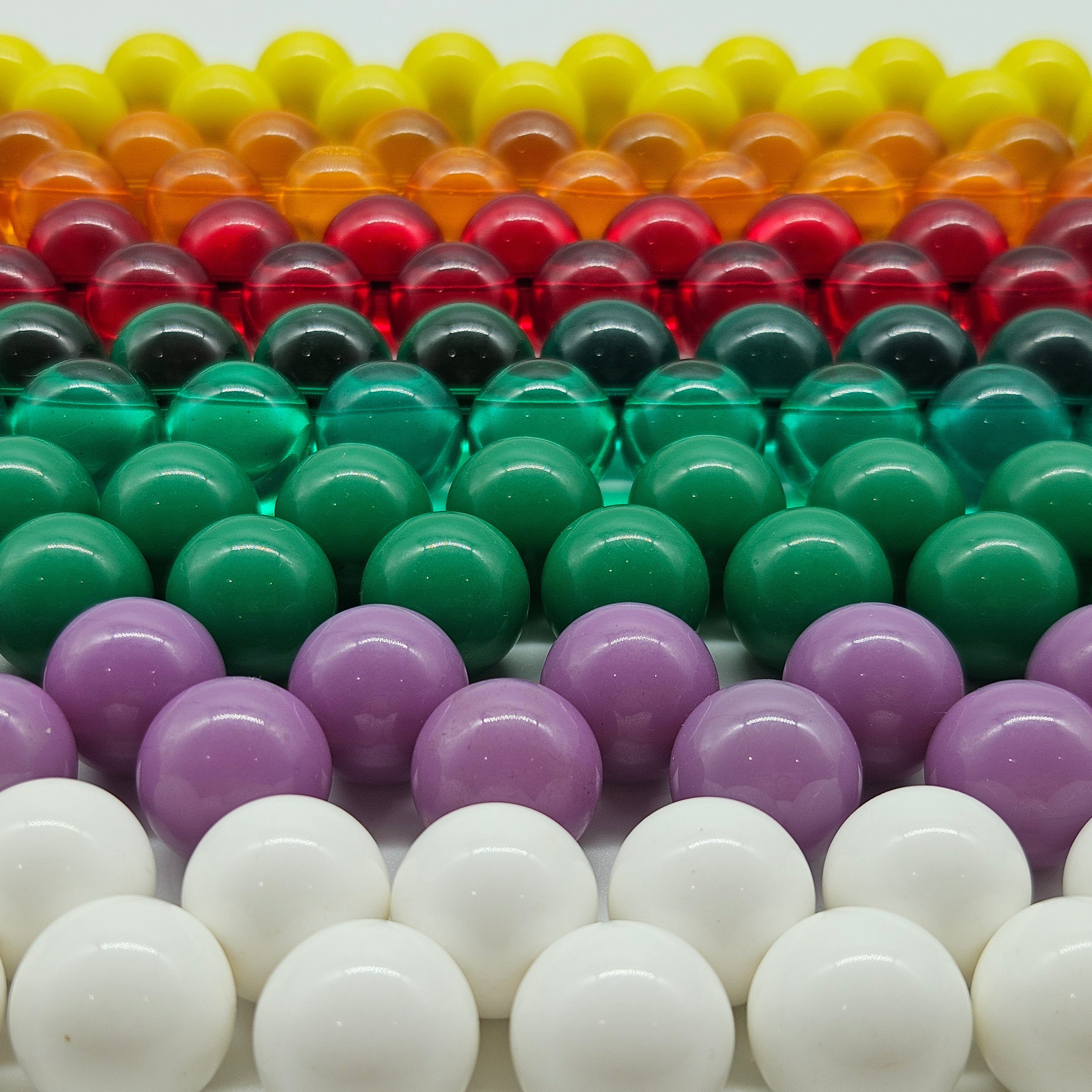 Colorful beaded necklaces in rows.