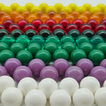 Colorful beaded necklaces in rows.
