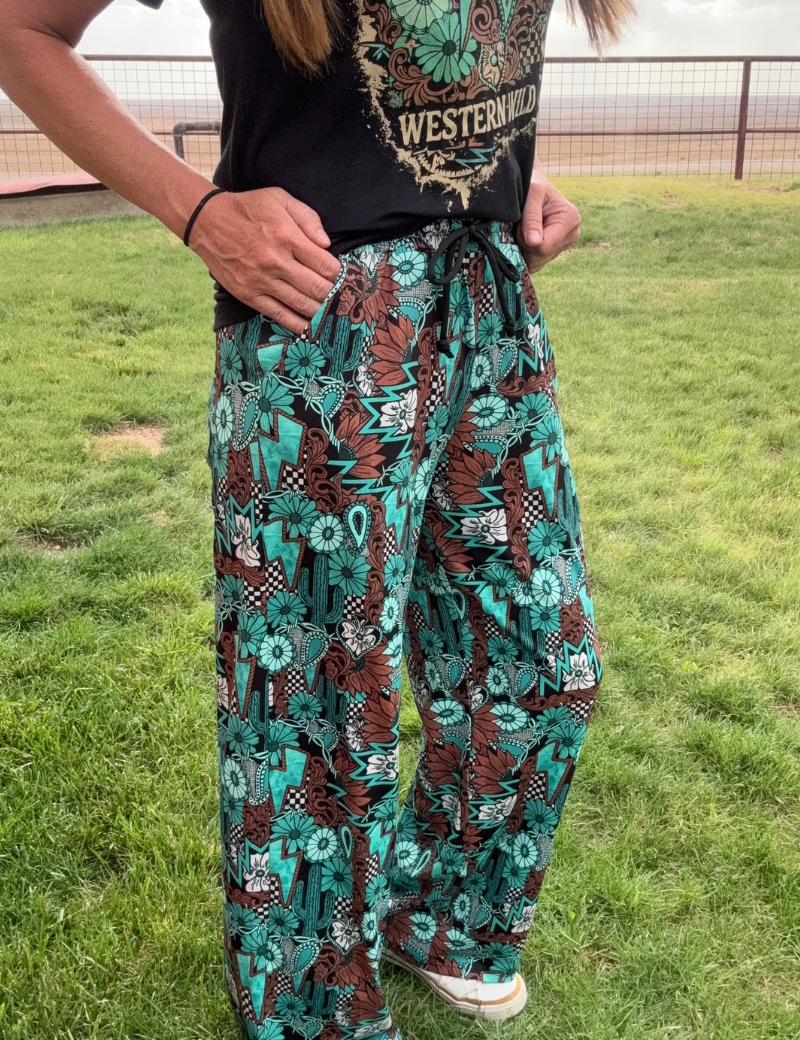 Tattoos in Turquoise Pants