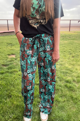 Tattoos in Turquoise Pants