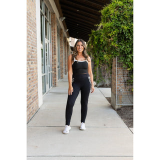 Julia Rose Carolina Cow Print Panel Leggings womenâ€™s boutique leggings front view, Woman wearing Julia Rose Carolina leggings with cow print panel detail