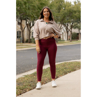 High-waisted maroon crossover leggings with pockets by Julia Rose, Julia Rose womenâ€™s maroon full length leggings lifestyle image