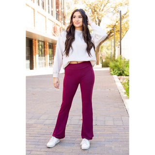 High-waisted maroon bootcut leggings with pockets by Julia Rose, Julia Rose womenâ€™s maroon flared leggings lifestyle image