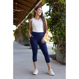 Julia Rose The Nova navy capri leggings with pocket, Women wearing navy capri leggings with side pocket