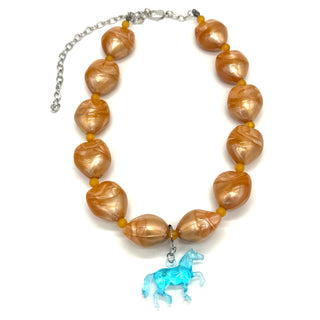 Necklace with brown beads and a blue horse charm on a white background