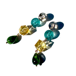 Multicolored beaded earrings on a white background