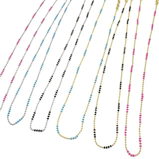 Set of multicolored beaded necklaces on a white background