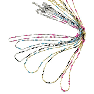 Set of colorful beaded necklaces on a white background