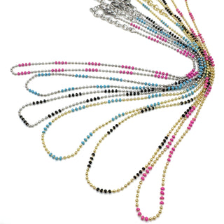 Set of colorful beaded necklaces on a white background