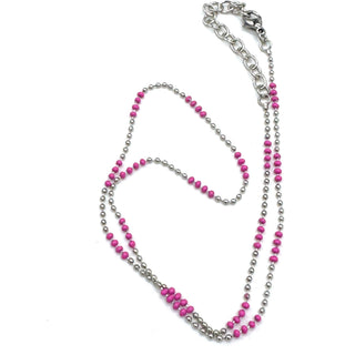 Necklace with pink and silver beads on a white background