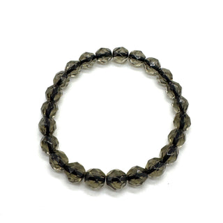 Beaded bracelet with faceted beads on a white background