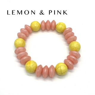 Bracelet with pink and yellow beads on a white background, featuring 'LEMON & PINK' text.