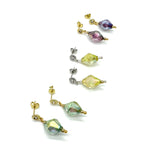 Multicolored beaded earrings on a white background