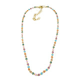 A golden chain necklace with colorful enameled links on a white background.