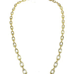 Gold chain necklace on a white background