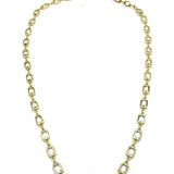 Gold chain necklace on a white background