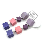 Colorful cube-shaped beaded earrings on a white background with 'Leetie Lovendale' branding.