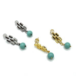 Silver and gold drop earrings with turquoise glass beads.