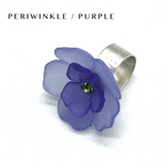 Floral cocktail ring on a white background labeled periwinkle/purple.