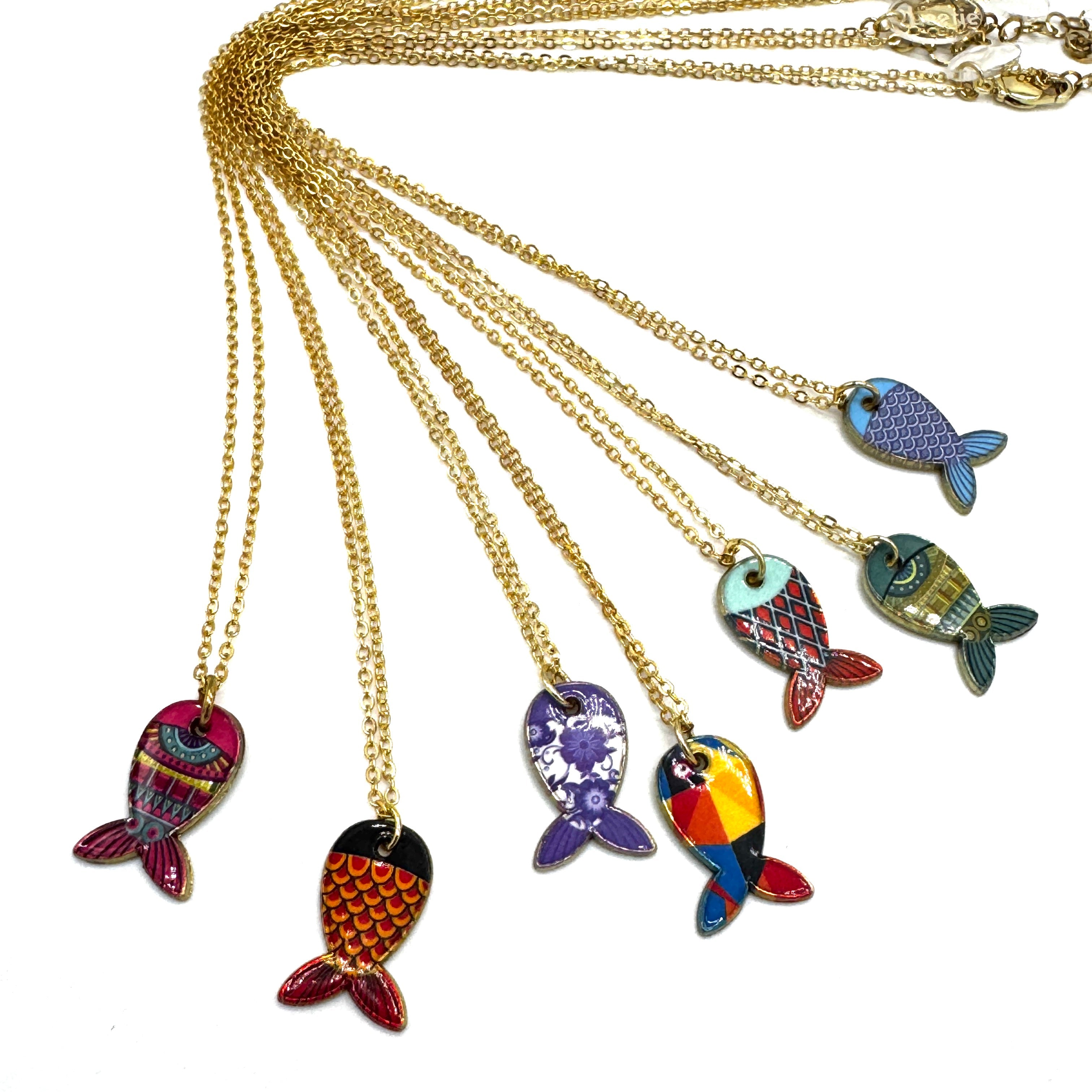 A set of gold chain necklaces with colorful fish-shaped pendants, displayed against a plain white background.