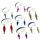 Six pairs of fish-shaped dangling earrings arranged on a white background, each with a small brand label reading 'LEETHE LOVENDALE'. The earrings come in green, blue, red, purple, and gold-tone finishes.