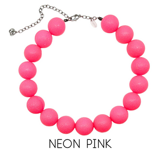 Neon pink beaded necklace on a white background with 'NEON PINK' text.
