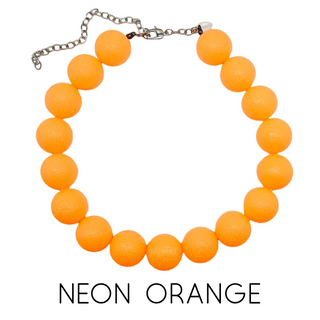 Neon orange beaded necklace on a white background with 'NEON ORANGE' text.