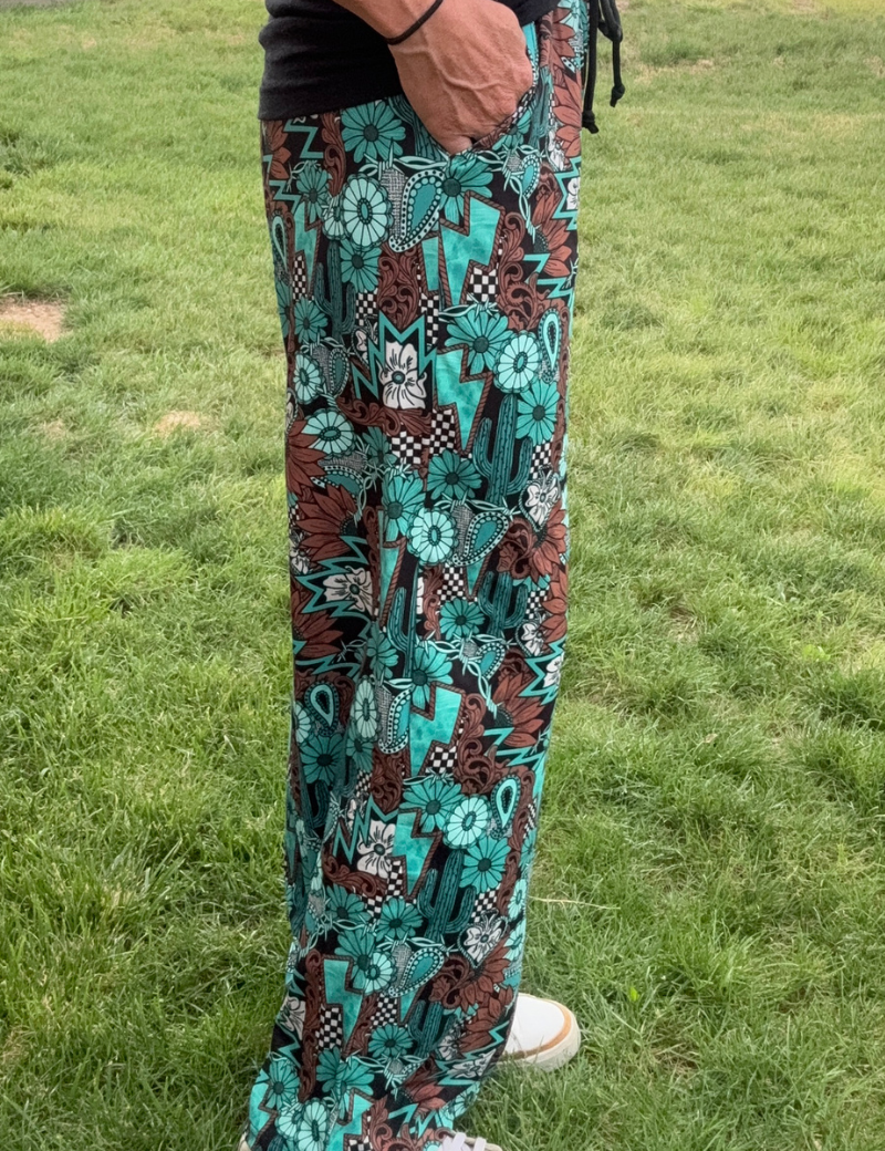 Tattoos in Turquoise Pants