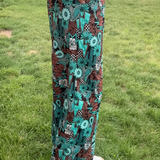 Tattoos in Turquoise Pants
