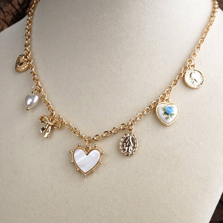 Keepsake Hearts – Multi-Charm Heart Necklace in Gold Tone