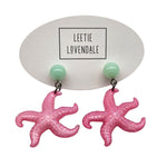 Pink starfish earrings on a white background with 'Leetie Lovendale' branding.